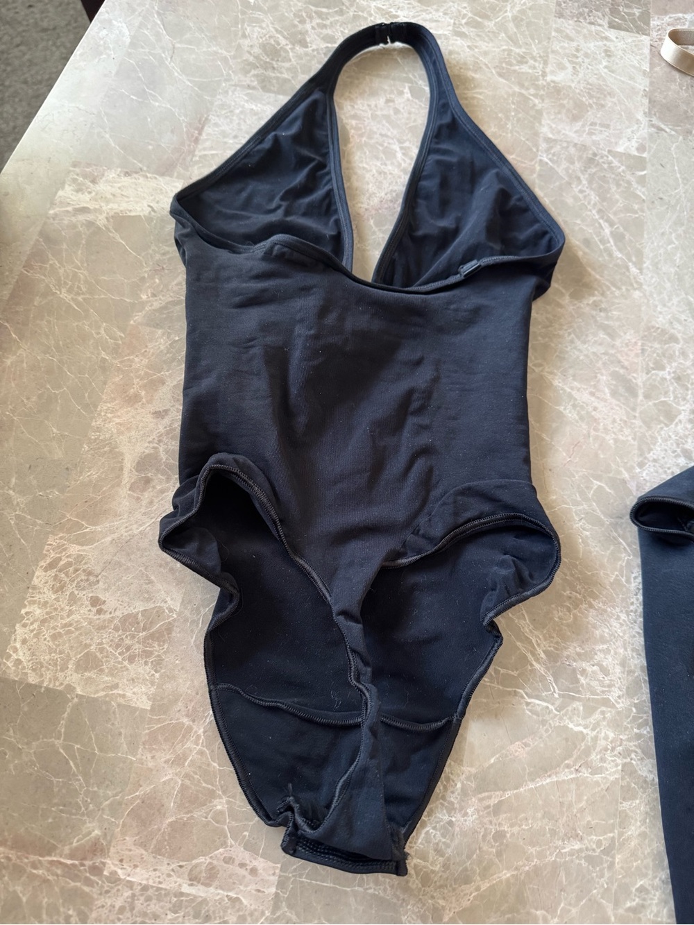 SKIMS Seamless Sculpt Deep Plunge
Thong Bodysuit - Picture 5 of 9
